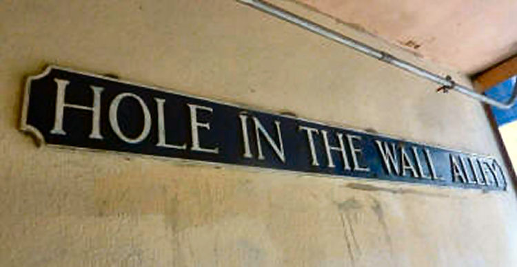 Hole in the Wall Alley sign