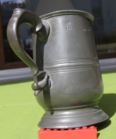 Pewter mug of Old Sun Inn hallmark