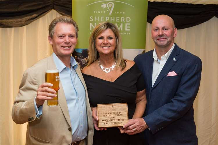 Jonathan Neame with Debbie and Jason Tharp 2019