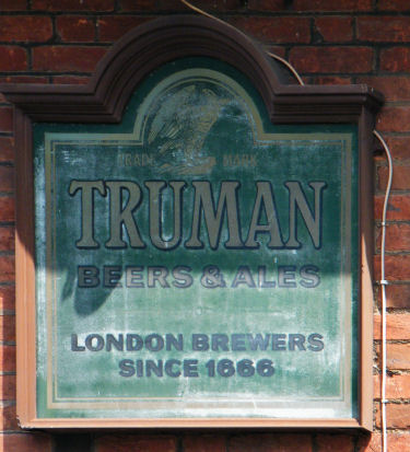 Bell and Crown Truman sign